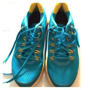 Turquoise and yellow nikes