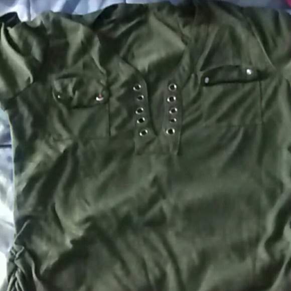 A navy green shirt - Picture 1 of 1