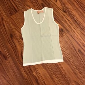 Sleeveless sweater/ blouse