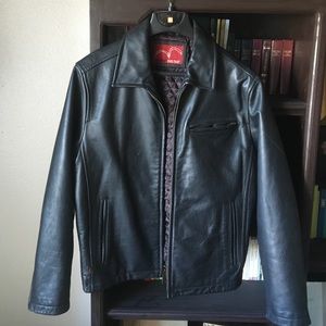 Black heavy leather biker jacket.