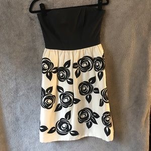 Strapless dress with roses on skirt