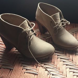 Restricted tan suede booties