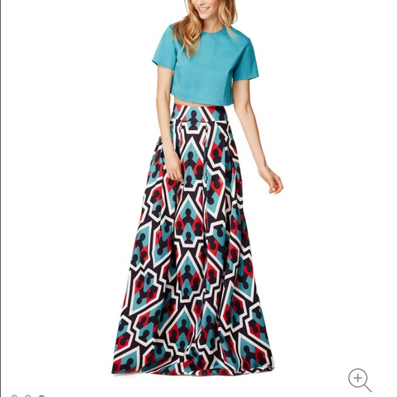 maxi montage skirt. Waist fitted, hips not fitted
