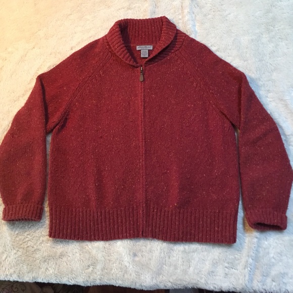Red knit zip sweater.
