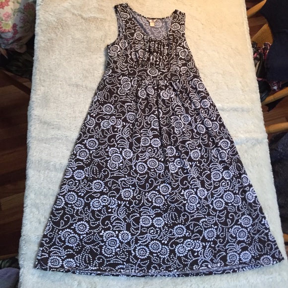 Brown and white flowered dress.