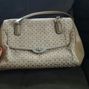 Tan and white needlepoint Coach shoulder bag