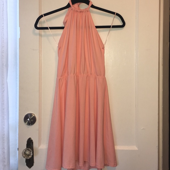 Peach halter dress with open back. Worn once.