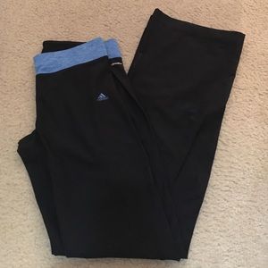 Black Adidas yoga pants with blue waistband