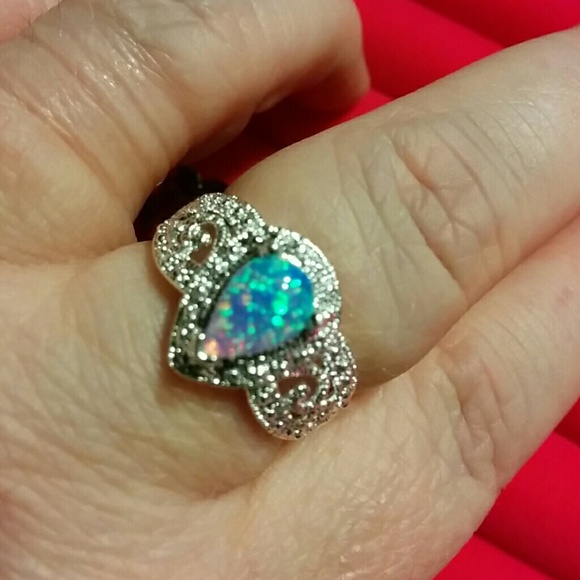 Opal set in platinum over sterling silver sz. 8