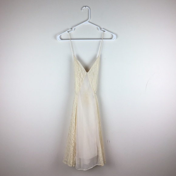 Backless cream dress.