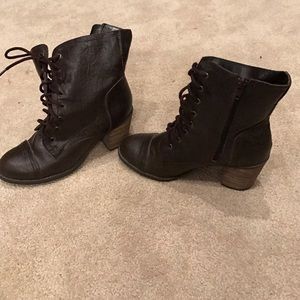 Brown heeled tie up combat boot