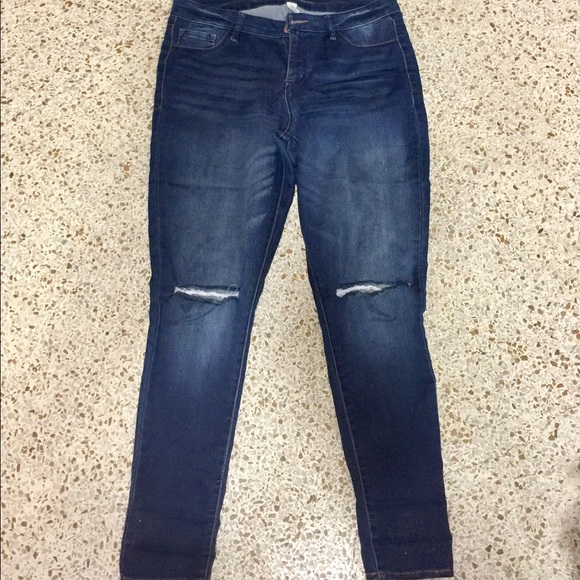 Trendy knee cut skinny jeans