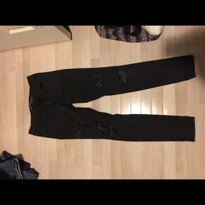 Distressed black American eagle jeans