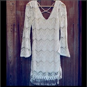 NEW! White embroidered Dress. Long sleeved.V neck.