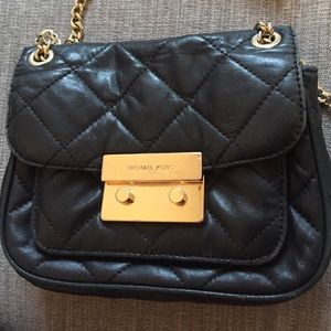 Michael Kors long gold strap black quilted purse