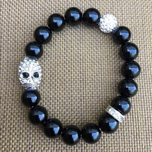 NWOT Black & silver skull bracelet