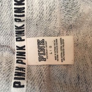 Pink hoodie mid zip..