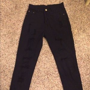 Never worn women's black ripped jeans