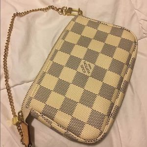 Authentic Louis Vuitton mini pochette accessories