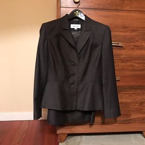 Dark gray Calvin Klein skirt suit.