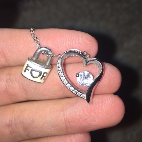 Heart necklace with charm