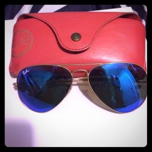 Ray Ban glasses sea blue glass gold frame.