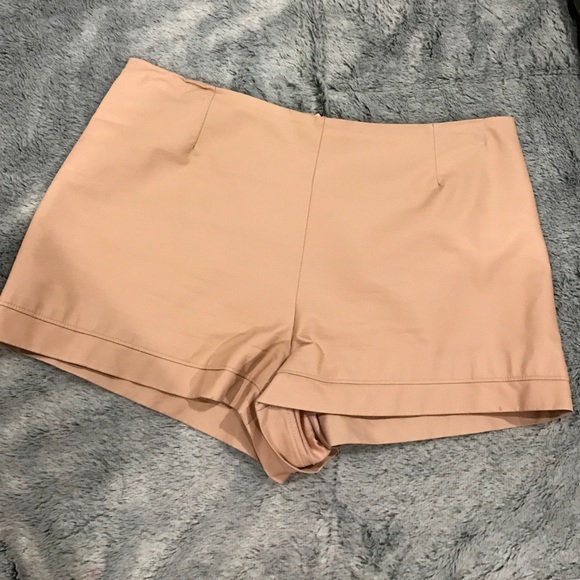 Pink leather shorts