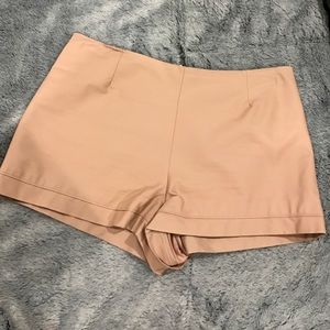 Pink leather shorts