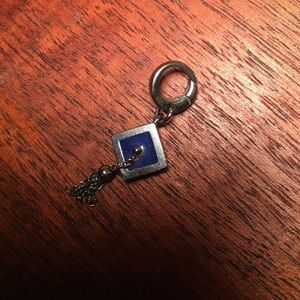 Fossil graduation cap charm