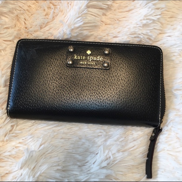 Black Kate Spade wallet. Cute polka dot interior.