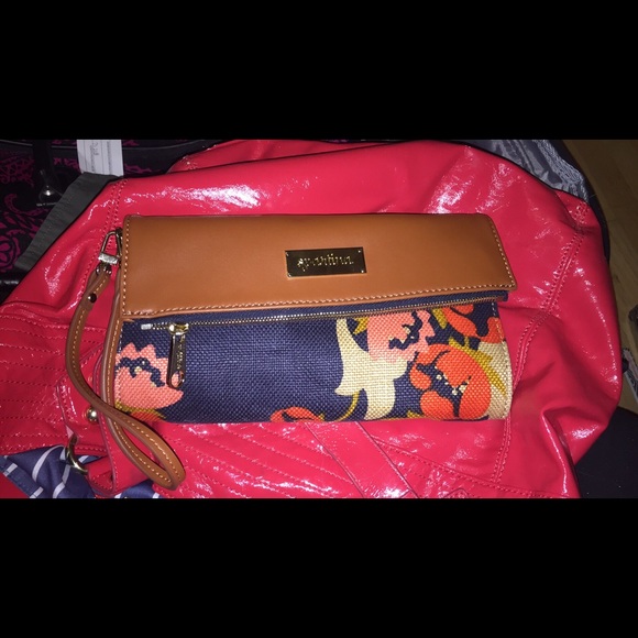 Brown/flowered clutch. Brand new