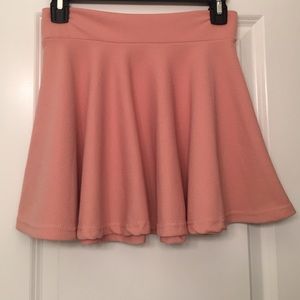 Pink skater skirt.