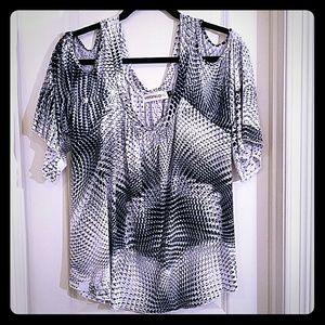 Flowy cold shoulder top with bell sleeves