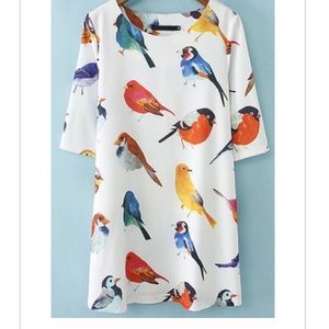 Dainty bird dress, sure to turn heads!!