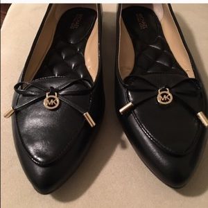 Black, pointy Michael Kors Flats.