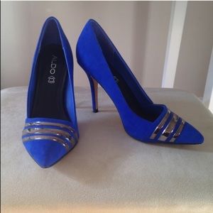 Royal blue pointy Aldo pumps.