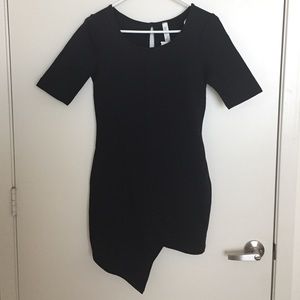 Asymmetrical fitted black dress