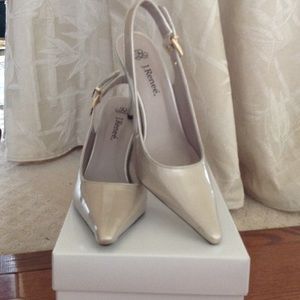 Classic cream patent leather sling backs