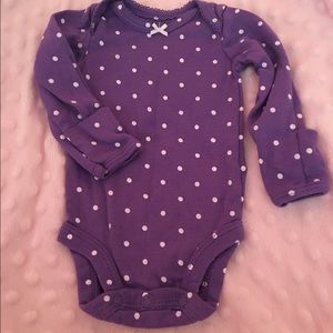 longsleeve purple and white onesie.