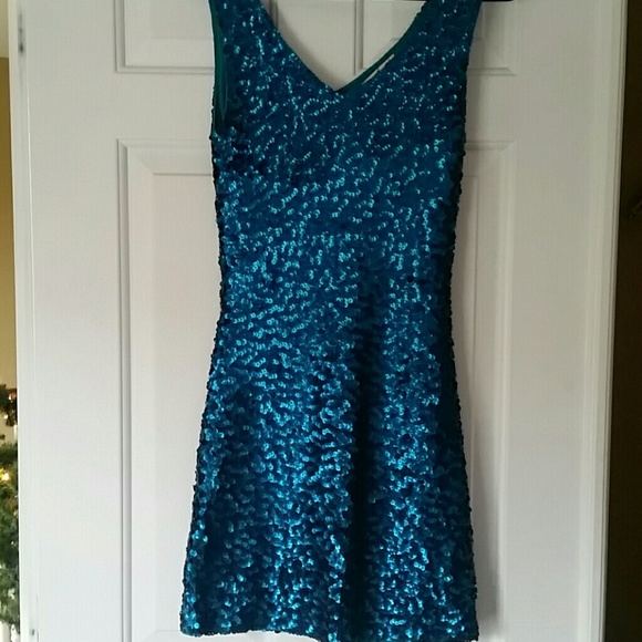 Party dress turquoise blue color beautiful.