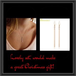 Beautiful gold tone necklace and earring set.