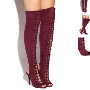 Thigh high lace up boots