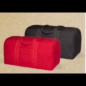 Black quilted duffle bag