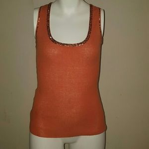 Sequined razor back BeBe tank.