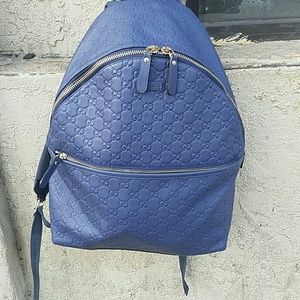 A rare navy blue Gucci book bag..