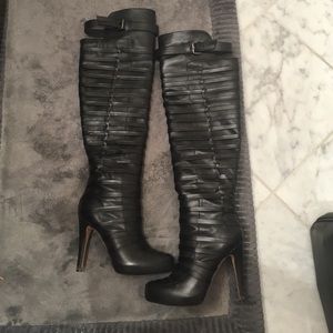 Black leather knee high boots