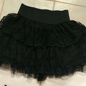 Mini black lace skirt