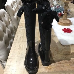 Coach black lace-up rain boots