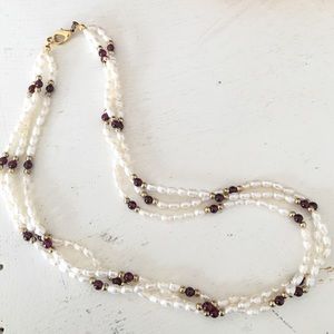 SOLD — Triple strand beaded necklace.