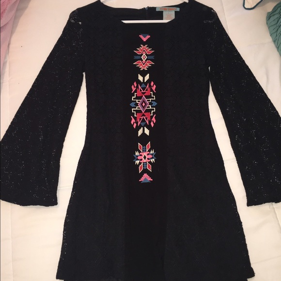 Long sleeve, beautifully printed black dress.